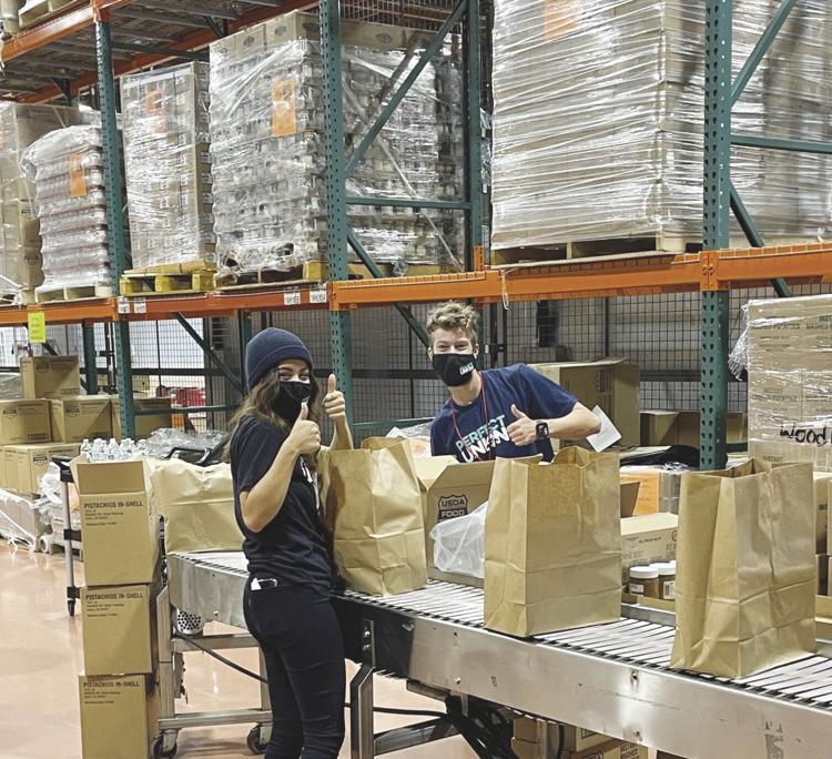 Employees pack food